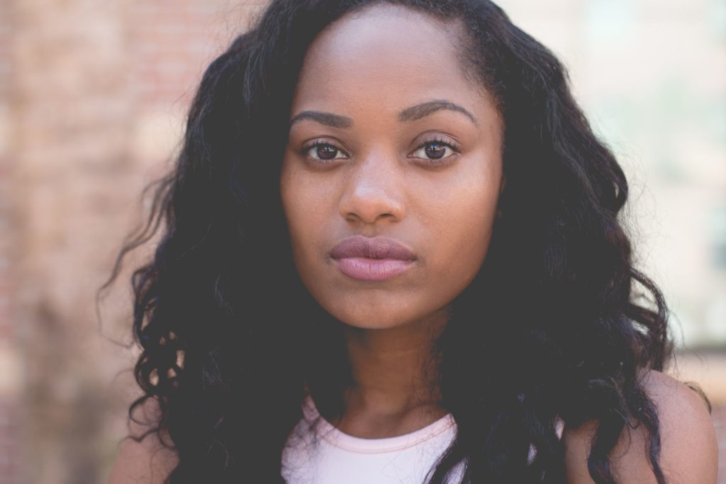 Picture of young black woman shot with shallow depth of field