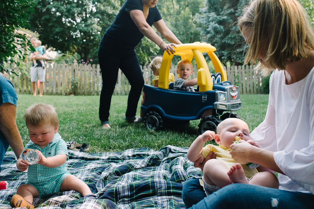 image of multiple subjects at a one year old birthday party