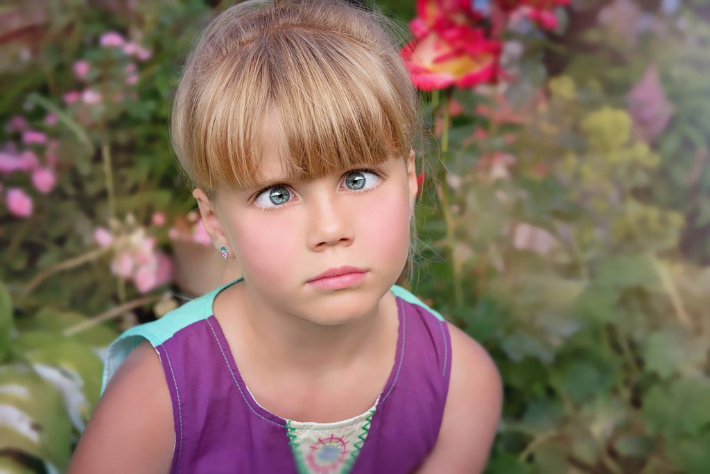 Image of a girl with a look of confusion on her face