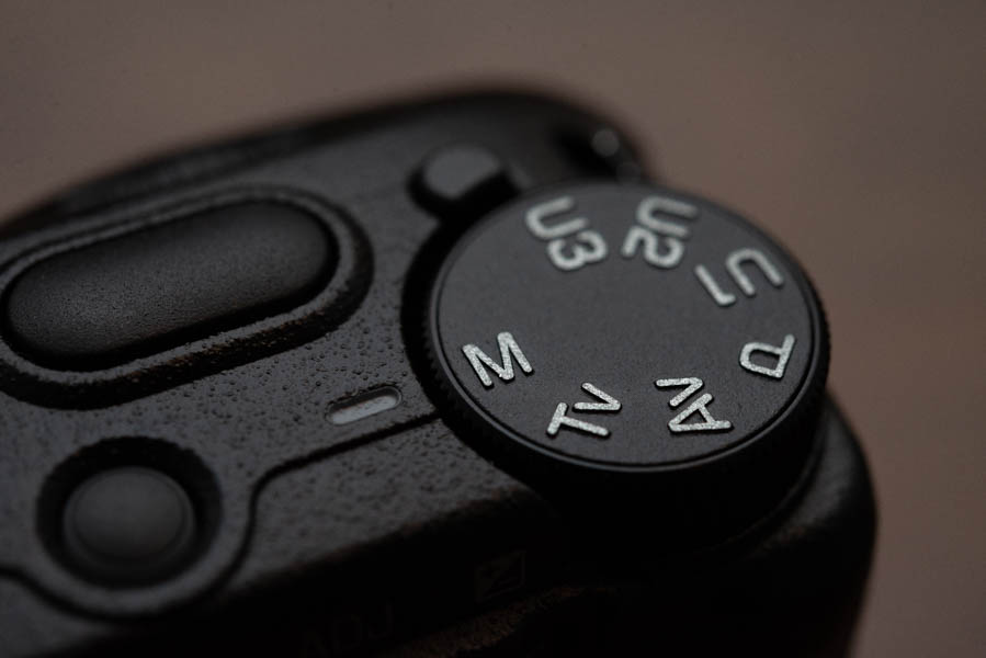 A mode dial on a point-and-shoot camera.