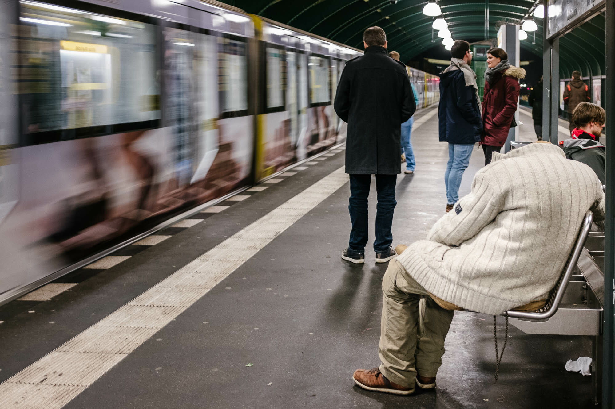 People waiting for a subway train.