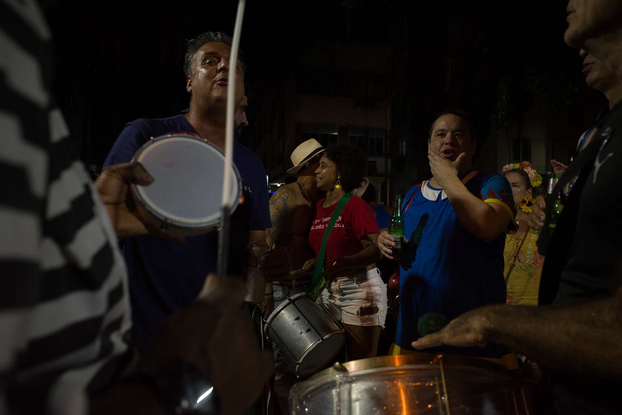 People singing and playing instruments during carnaval in Rio de Janeiro before editing.