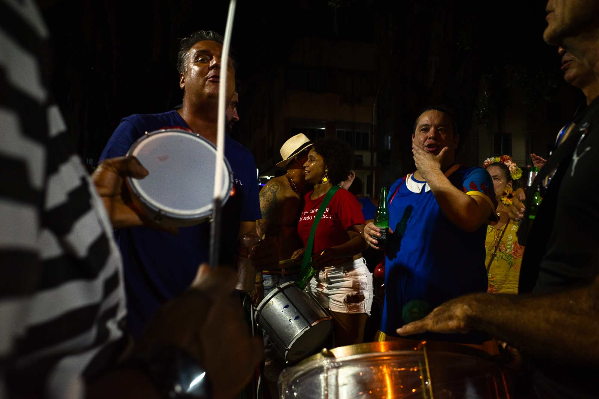 People singing and playing instruments during carnaval in Rio de Janeiro after editing.