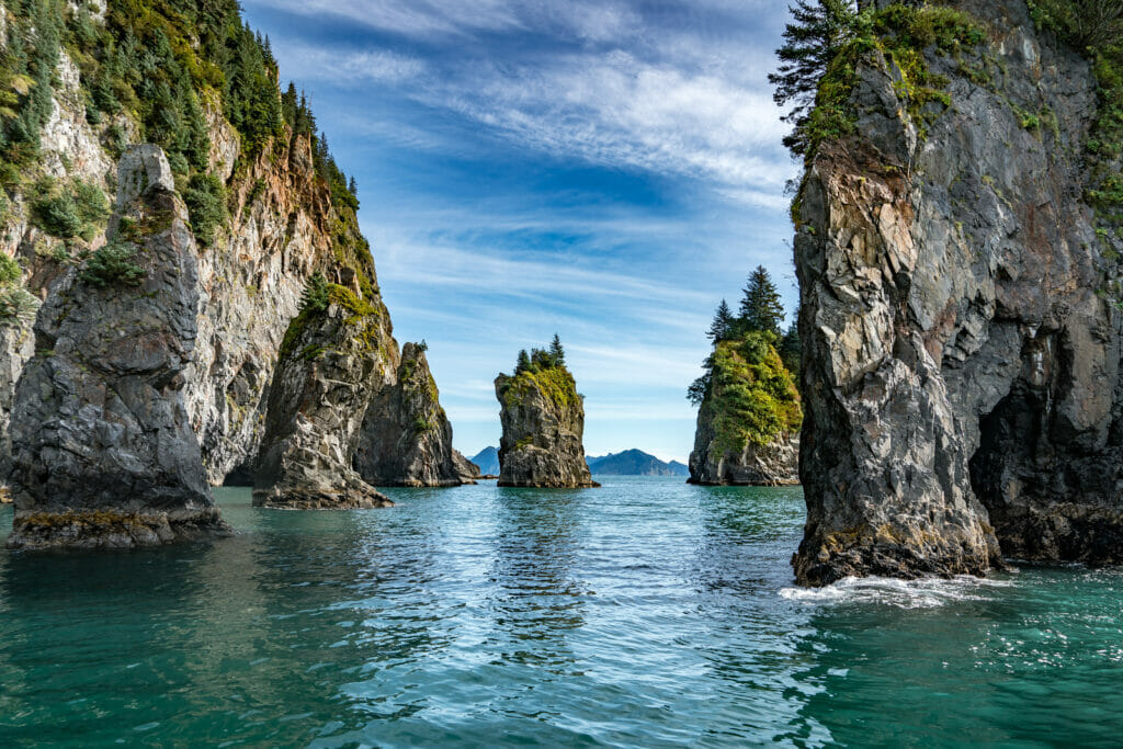 An ocean with rock formations.