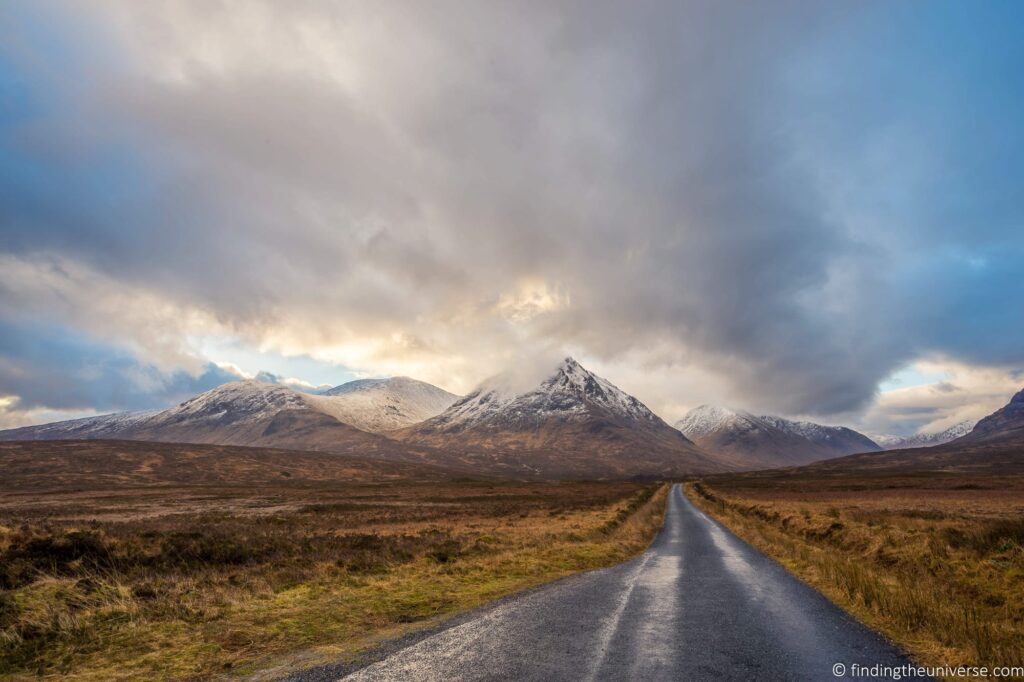 A road leading to mountains.