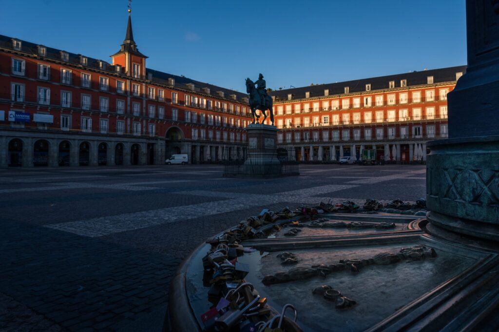 A square with locks on a monument.