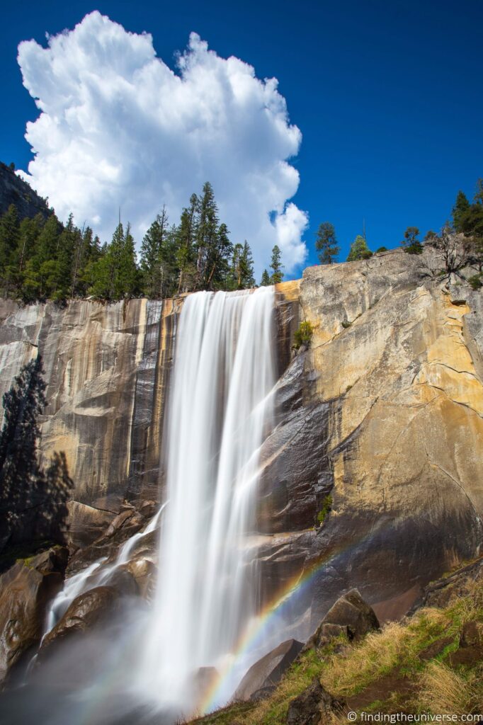 A waterfall over a rock cliff.