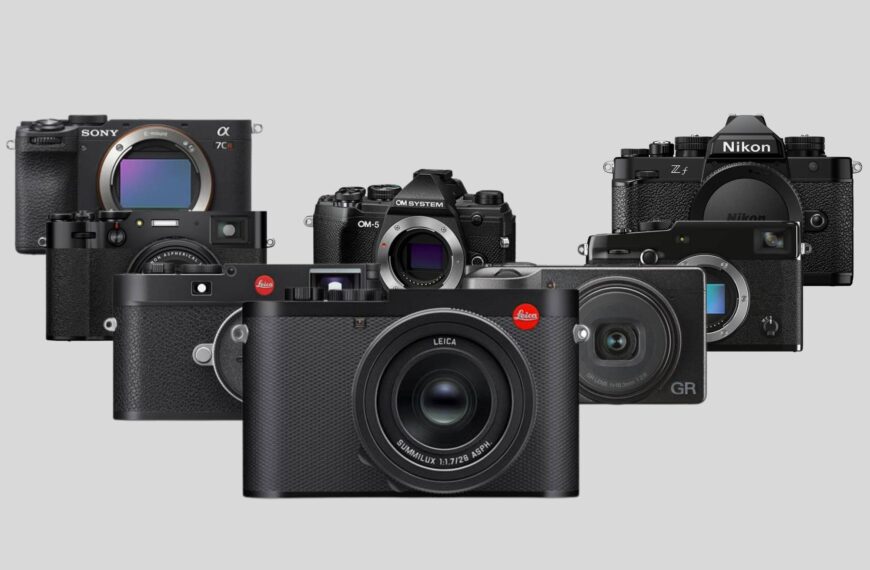 Black cameras on a gray background.